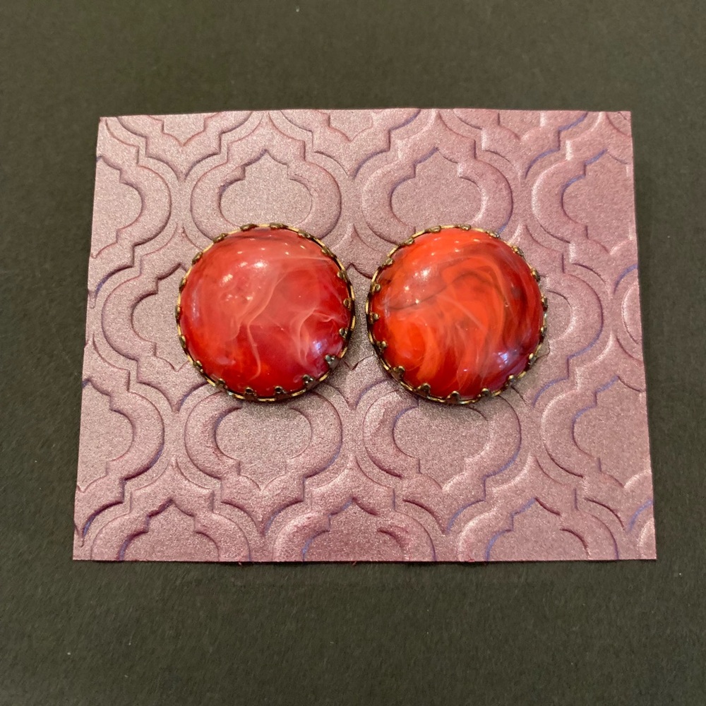 Red galaxy clip on earrings